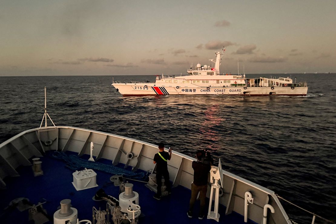 A Chinese Coast Guard vessel blocks a Philippine Coast Guard ship on its way to a resupply mission at Second Thomas Shoal in the South China Sea on March 5, 2024.