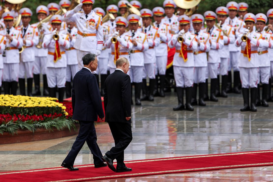Russia's President Vladimir Putin participates in a welcome ceremony hosted by Vietnam's President To Lam, at the Presidential Palace in Hanoi on June 20, 2024.