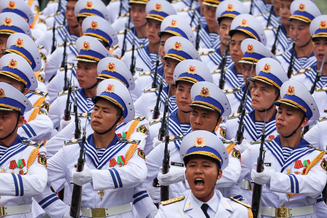 Members of an honor guard stand in formation during the welcome ceremony for Russia's President Vladimir Putin hosted by Vietnam's President To Lam on June 20, 2024.