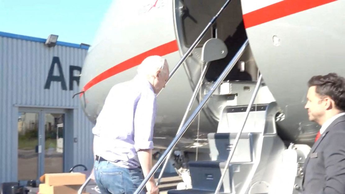 WikiLeaks founder Julian Assange boards a plane at a location given as London in this still image from video released on June 25, 2024.