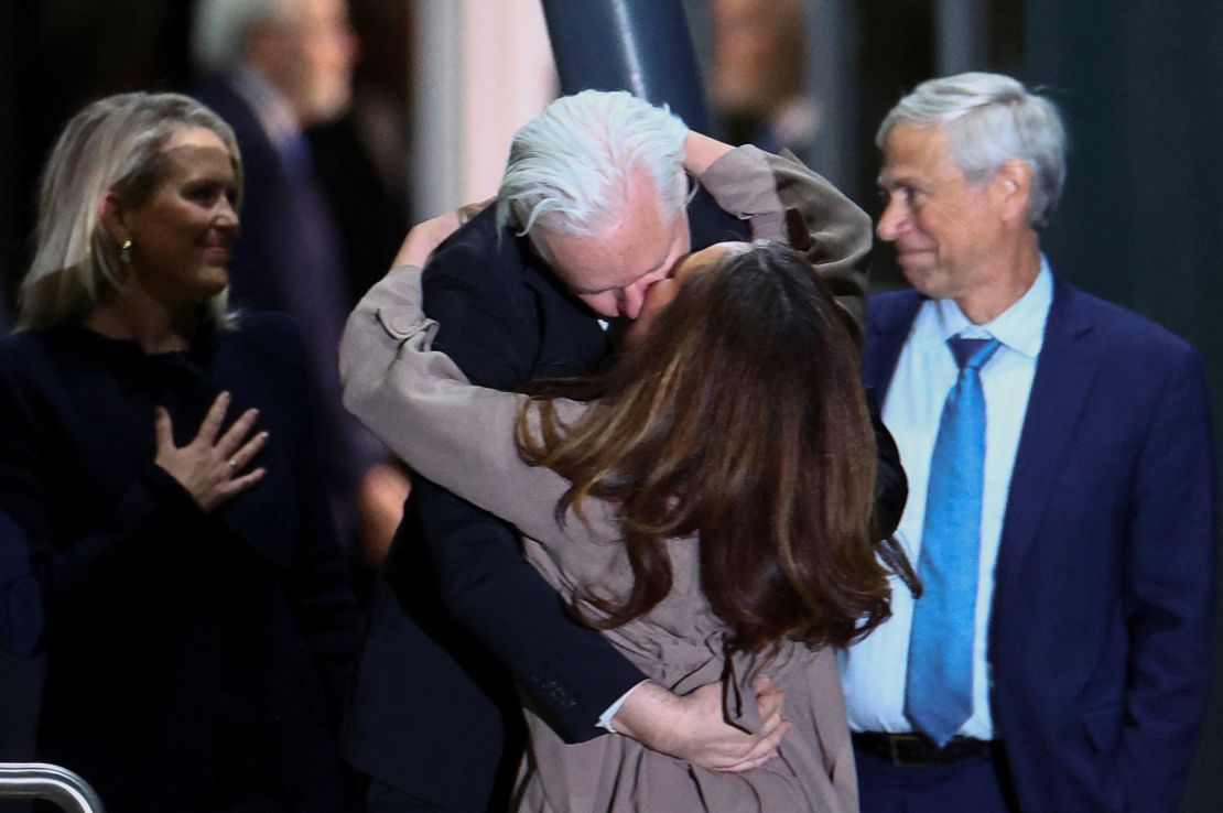 WikiLeaks founder Julian Assange kisses his wife, Stella Assange, as he arrives in Canberra, Australia, June 26, 2024.