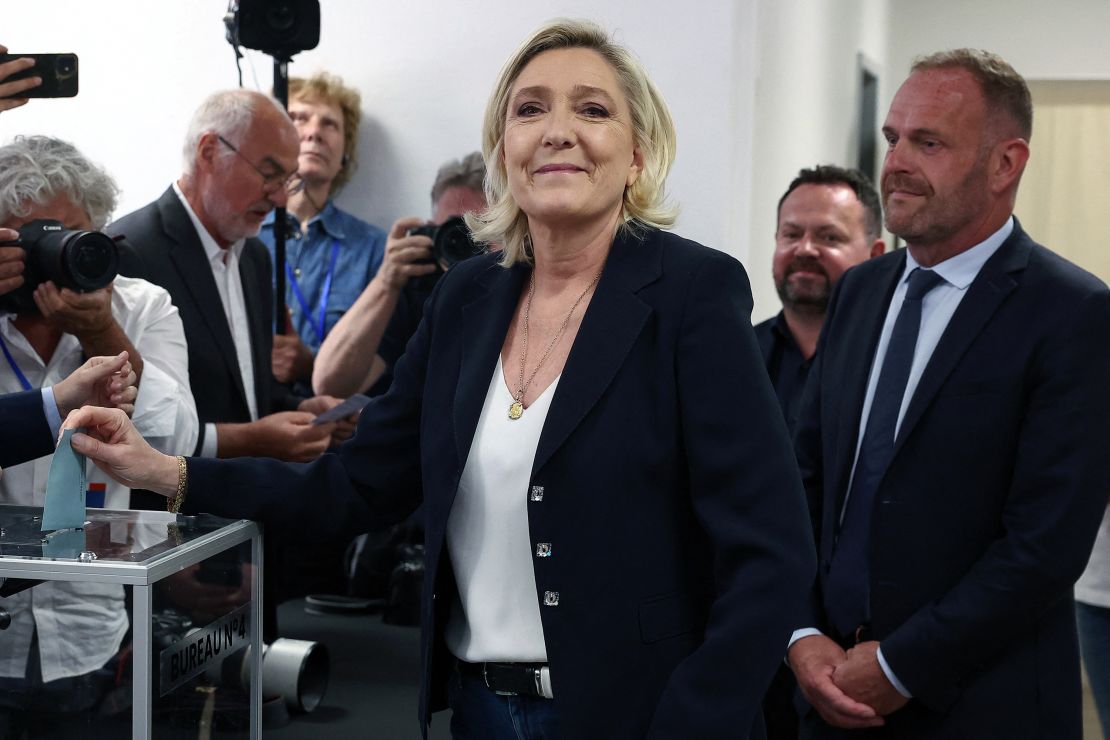 Marine Le Pen casts her ballot at a polling station in Henin Beaumont, June 30, 2024.