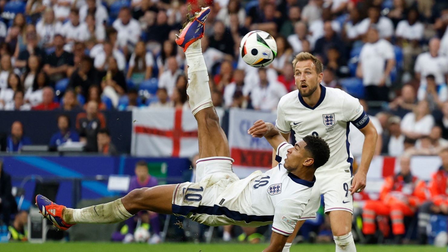 England's Jude Bellingham scores his team's first goal against Slovakia.