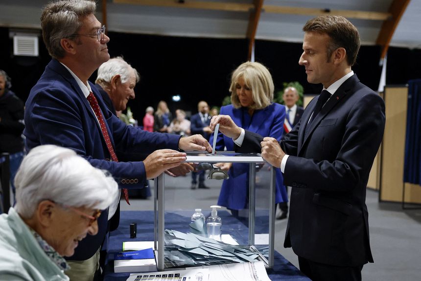 French President Emmanuel Macron voted adjacent to First Lady Bridget Macron at the polling station on July 7, 2024.