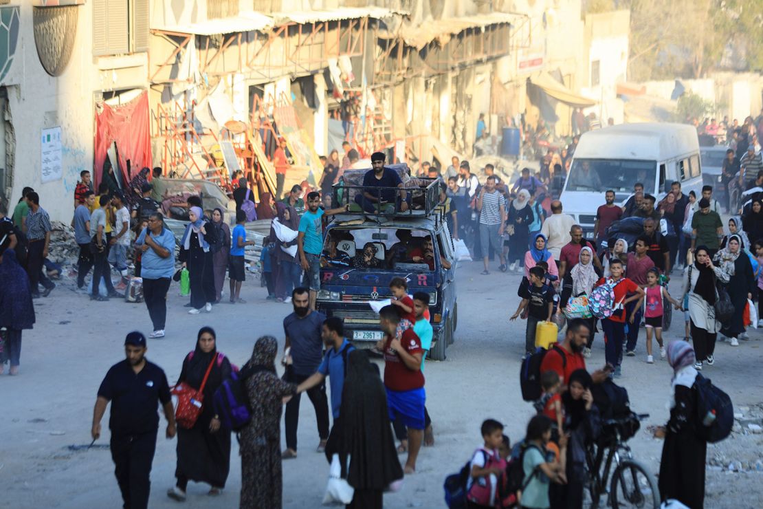 Palestinians flee the eastern part of Gaza City after they were ordered by the Israeli army to evacuate their neighborhoods on July 7, 2024.