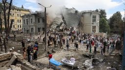 Rescuers work at Kyiv's Okhmatdyt hospital, which was damaged in a Russian missile strike on Monday morning.