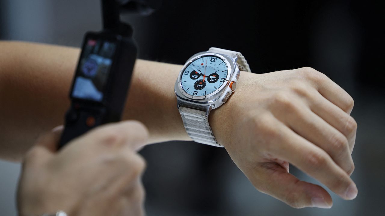 An attendee films Samsung Electronics' Galaxy Watch 7 Ultra during its unveiling ceremony in Seoul, South Korea, on July 8, 2024.