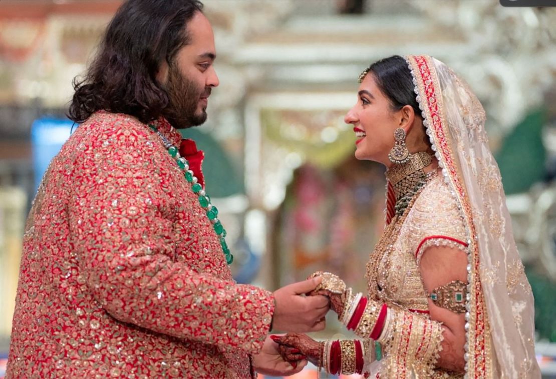 Anant Ambani, son of Indian billionaire Mukesh Ambani, and Radhika Merchant, daughter of industrialist Viren Merchant, react during their wedding celebrations in Mumbai, India, July 12, 2024. Reliance Industries/Handout via REUTERS THIS IMAGE HAS BEEN SUPPLIED BY A THIRD PARTY. NO RESALES. NO ARCHIVES.