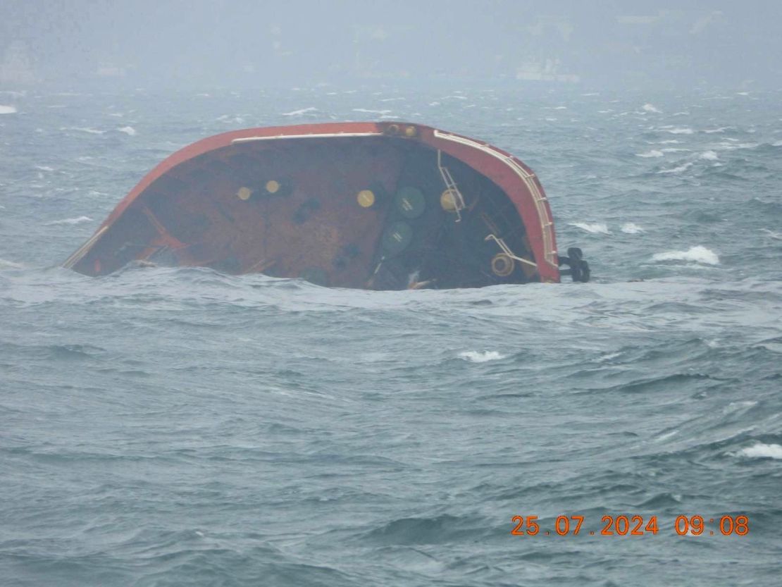 A handout photo released by the Philippine Coast Guard shows the tip of MT Terra Nova protruding in Manila Bay, Philippines, July 25, 2024.