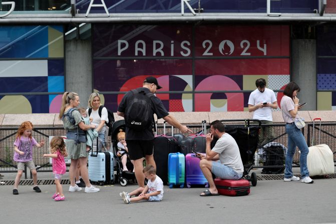 Travellers from Sydney wait outside the Gare Montparnasse train station on July 26. Just hours before the opening ceremony,?<a >France’s high-speed train lines were targeted by several “malicious” acts</a>, including arson, in what has been described as “coordinated sabotage” to disrupt travel ahead of the Games.