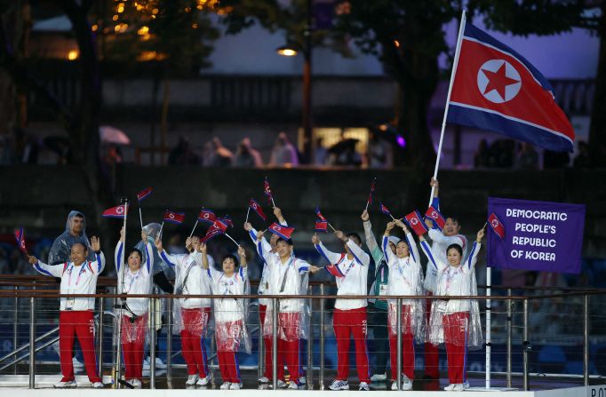 North Korean athletes wave during the Parade of Nations. North Korea <a >was barred from competing at the 2022 Winter Olympics in Beijing</a> as part of its punishment for its “unilateral decision” to drop out of the Summer Games in Tokyo in 2021.