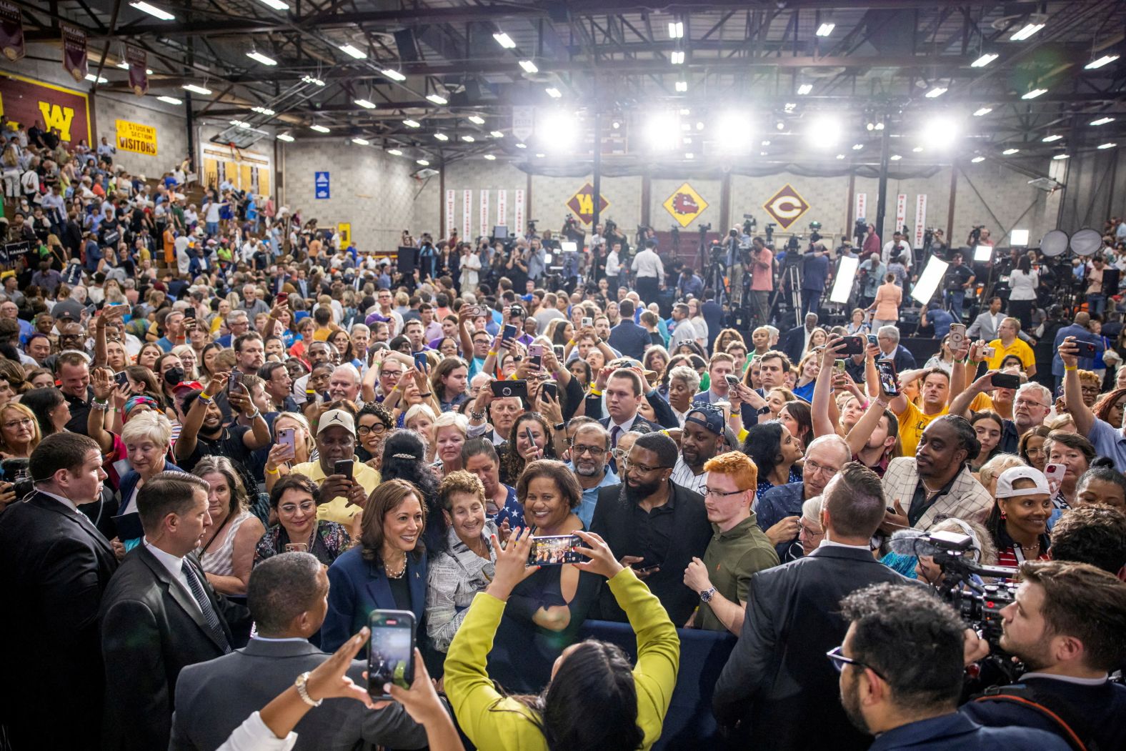 Harris, bottom left in the blue jacket, attends <a href="index.php?page=&url=https%3A%2F%2Fwww.cnn.com%2F2024%2F07%2F23%2Fpolitics%2Fwisconsin-visit-kamala-harris-campaign%2Findex.html">her first campaign rally</a> in West Allis, Wisconsin, on July 23. The former US senator from California, who previously served as the state’s attorney general, was endorsed by Biden to be his successor.