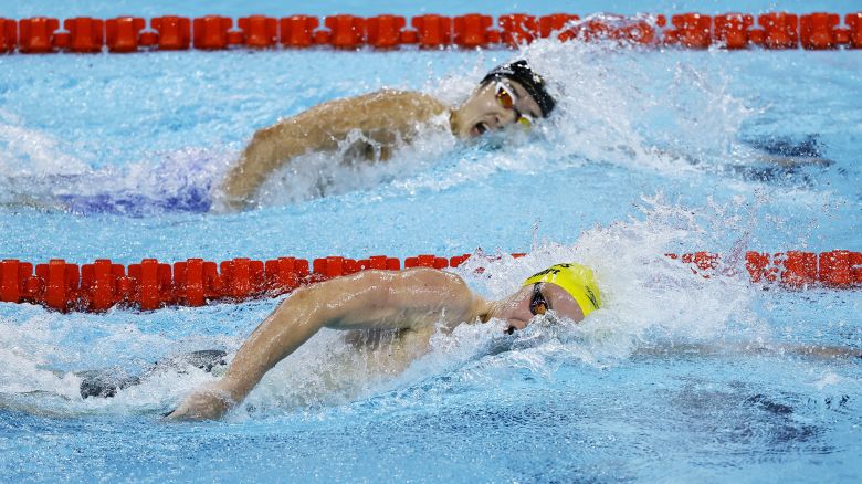 Paris 2024 Olympics - Swimming - Men's 400m Freestyle - Heats - Paris La Defense Arena, Nanterre, France - July 27, 2024. Samuel Short of Australia and Woomin Kim of South Korea in action during Heat 4. REUTERS/Ueslei Marcelino