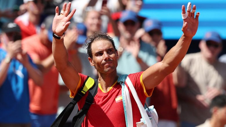 Rafael Nadal of Spain waves after losing his match against Novak Djokovic of Serbia.