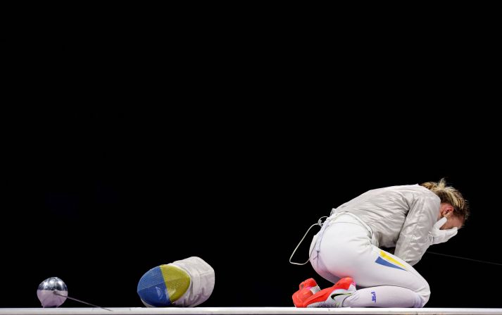 Ukrainian fencer Olga Kharlan reacts after <a >winning her bronze-medal sabre bout</a> on July 29. It's her country’s first medal of the Paris Olympics.