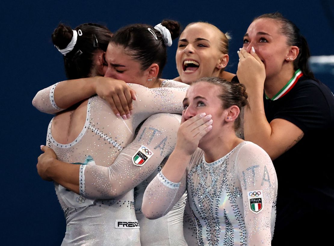 Paris 2024 Olympics - Artistic Gymnastics - Women's Team Final - Bercy Arena, Paris, France - July 30, 2024. Angela Andreoli of Italy celebrates after her performance on the Floor Exercise with teammates. REUTERS/Mike Blake