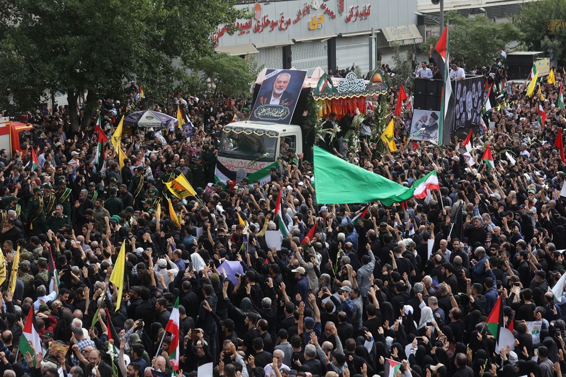 Iranians attend the memorial procession of assassinated Hamas chief, Ismail Haniyeh, in Tehran, Iran, August 1, 2024.