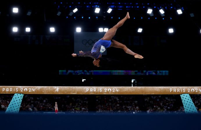 US gymnast Simone Biles competes on the balance beam during the individual all-around on Thursday, August 1. <a >She won the gold</a>, completing her comeback story and regaining her title from 2016.