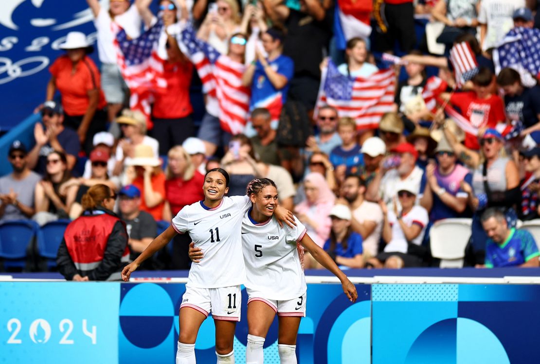 Sophia Smith and Trinity Rodman celebrate the USWNT's victory against Japan.