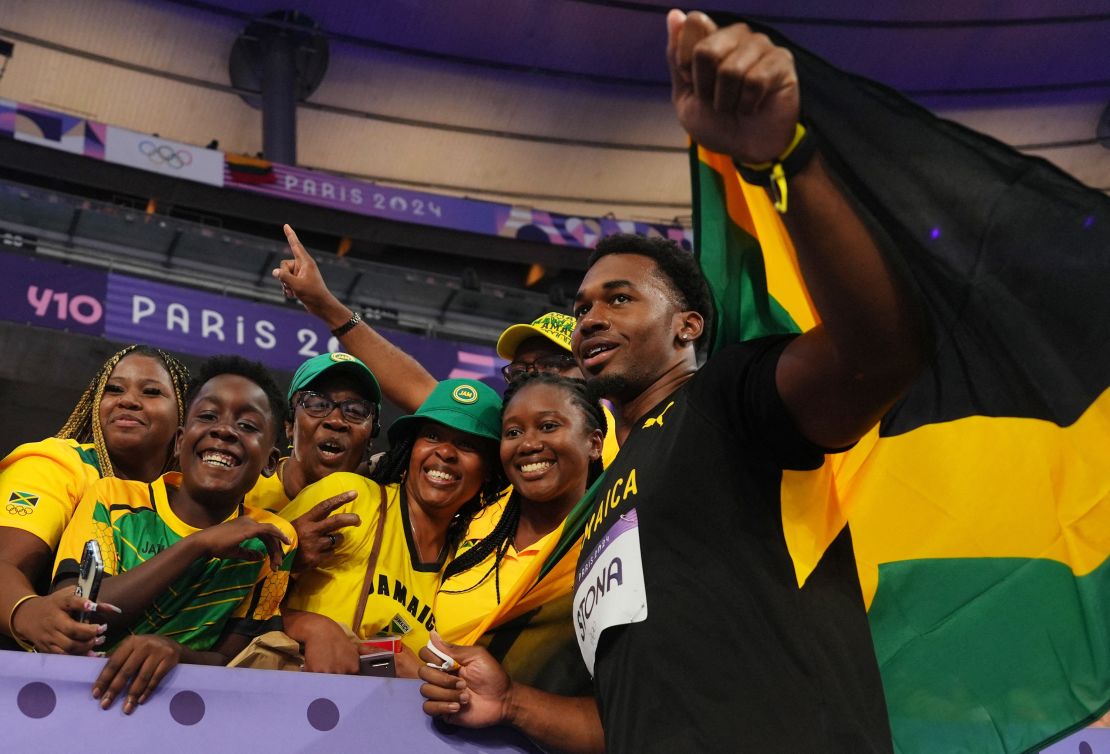 Paris 2024 Olympics - Athletics - Men's Discus Throw Final - Stade de France, Saint-Denis, France - August 07, 2024. Gold medallist Roje Stona of Jamaica celebrates after winning and setting a new Olympic record. REUTERS/Aleksandra Szmigiel