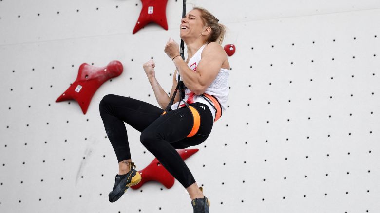 Paris 2024 Olympics - Climbing - Women's Speed, Big Final - Le Bourget Sport Climbing Venue, Le Bourget, France - August 07, 2024. Aleksandra Miroslaw of Poland celebrates winning gold medal.