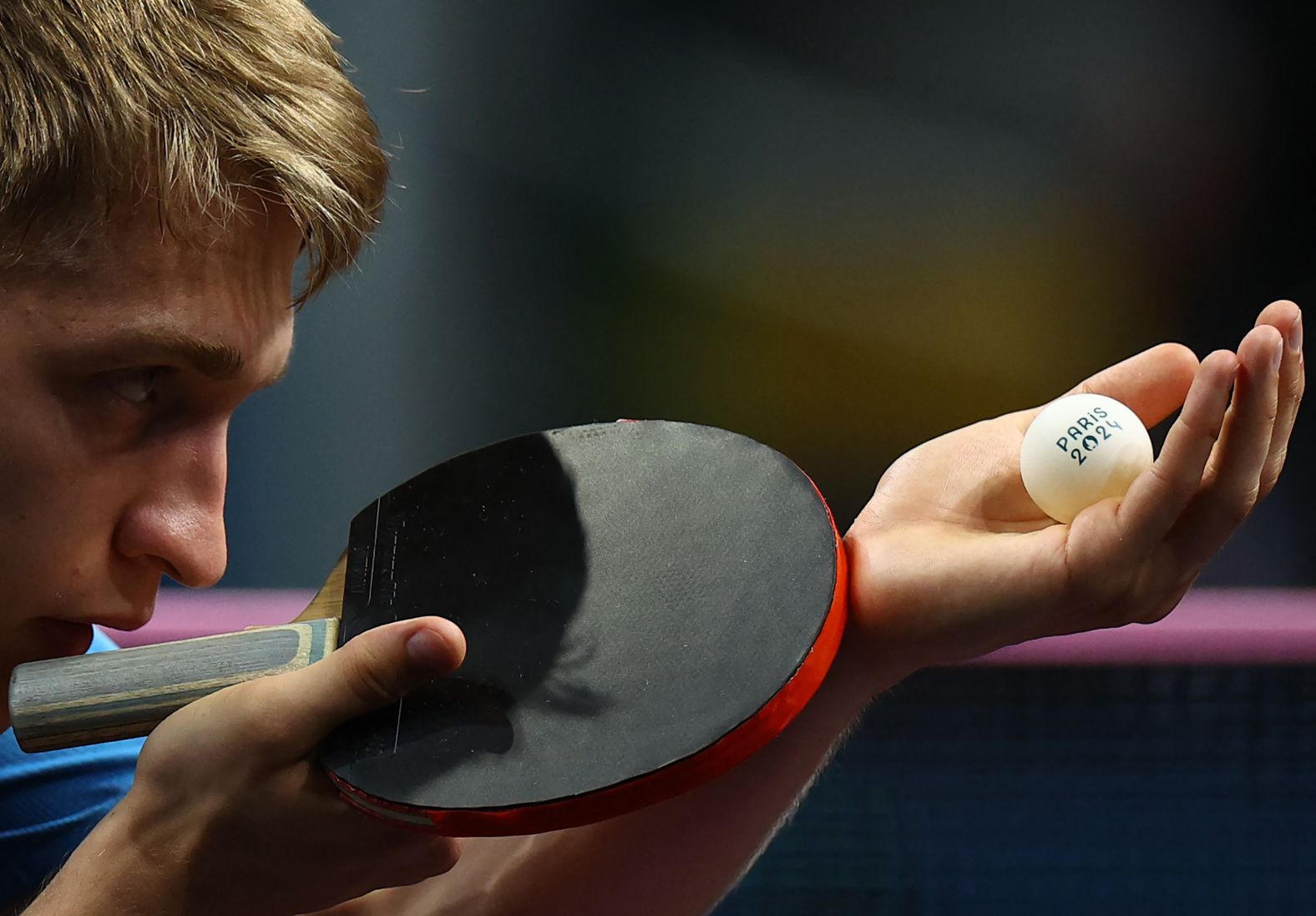 Swedish table tennis player Anton K?llberg prepares to serve during a semifinal match on August 7.