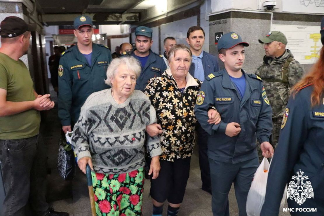 Russian authorities help residents during evacuation efforts at a railway station in Oryol, Kursk region, August 9, 2024.