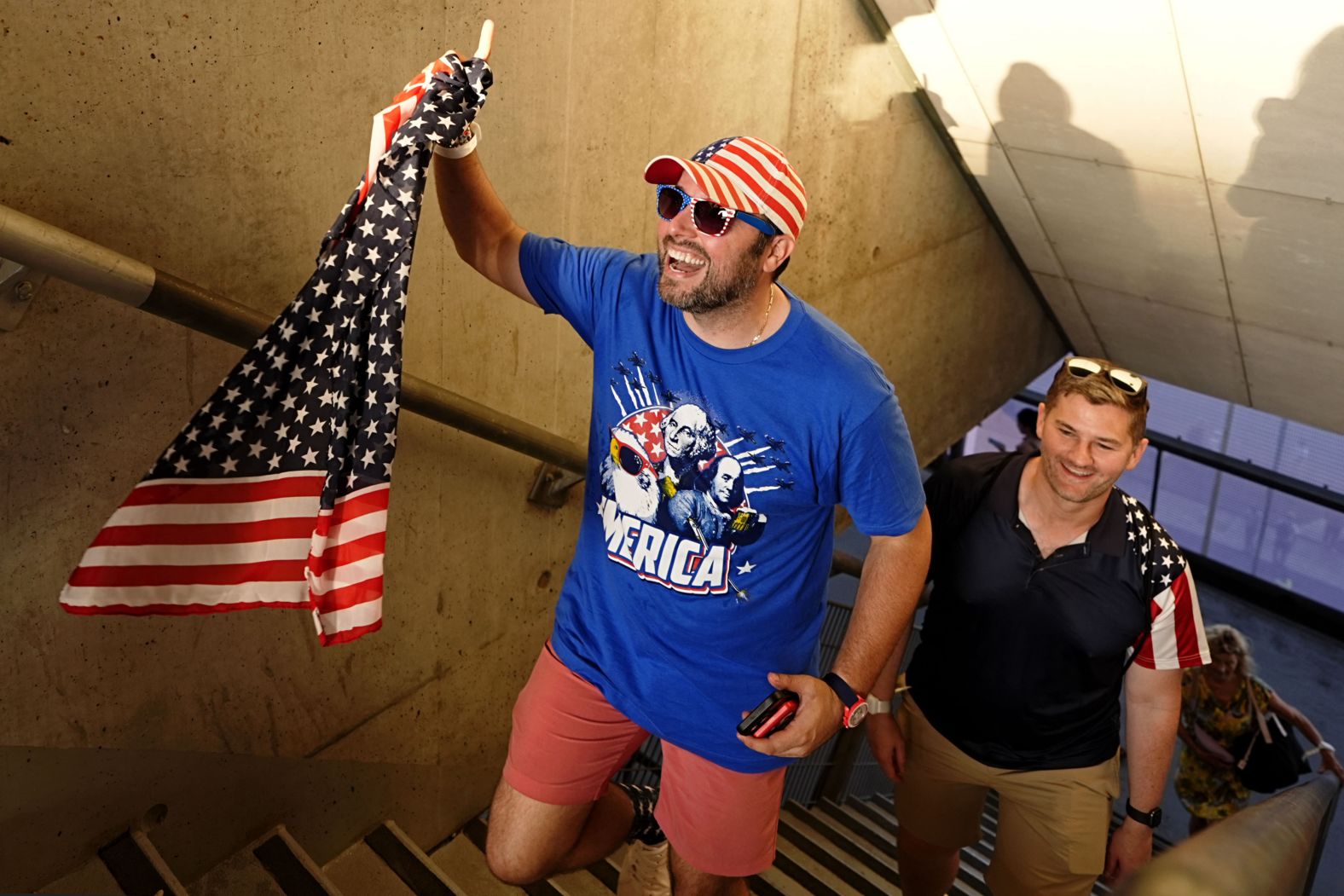 US supporters walk to their seats before the ceremony.