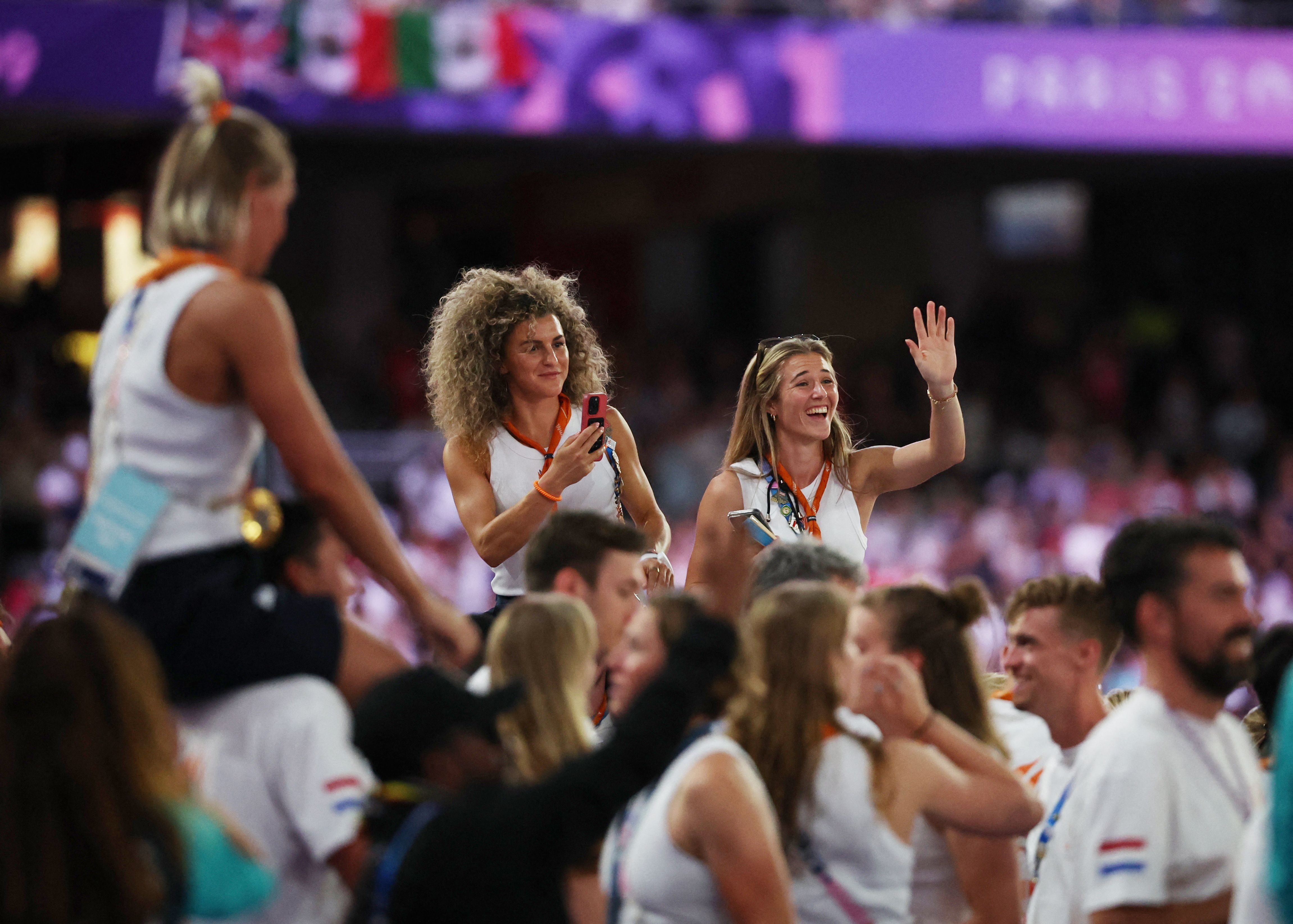 Dutch athletes take part in the ceremony's parade.