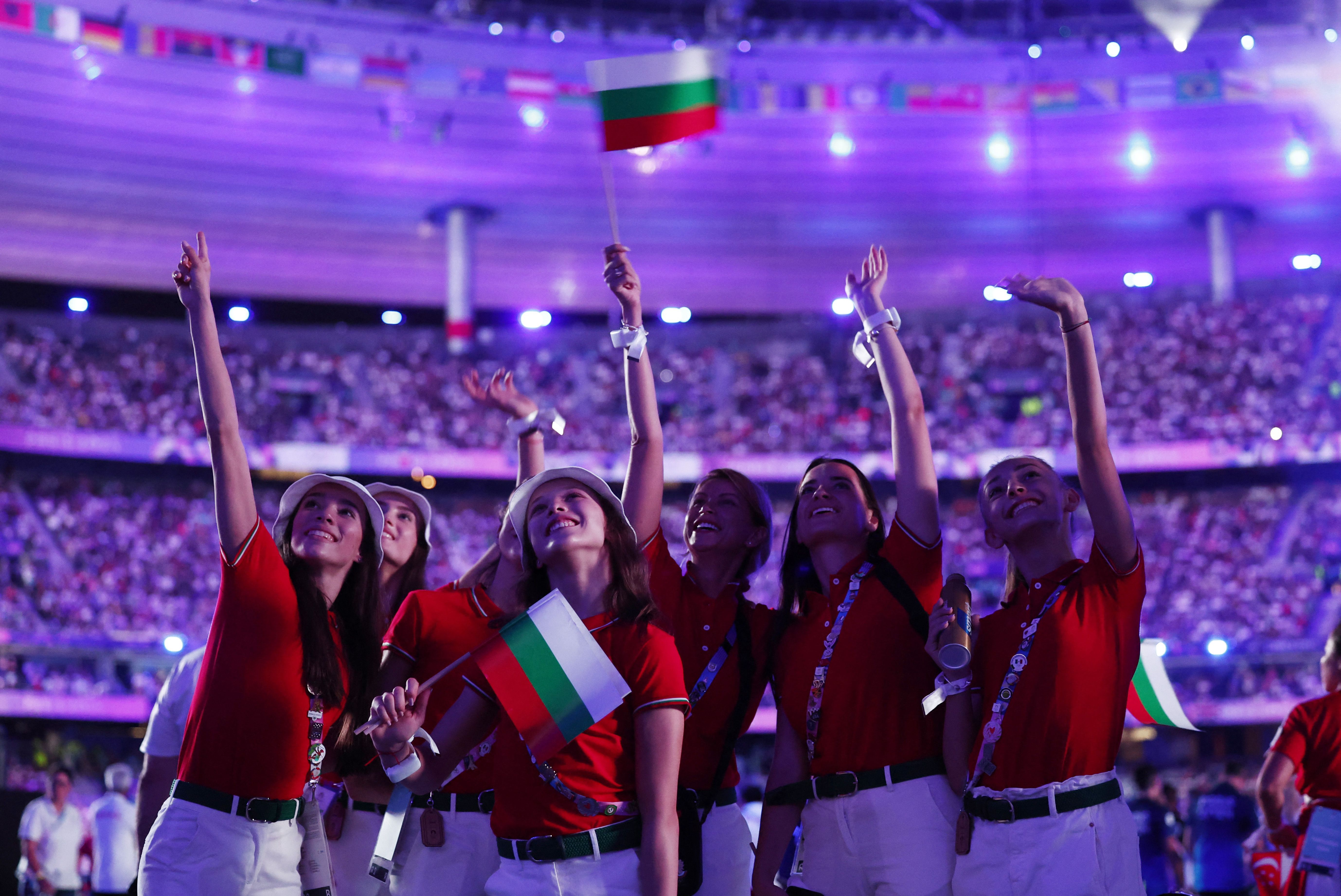 Bulgarian athletes cheer during the closing ceremony.