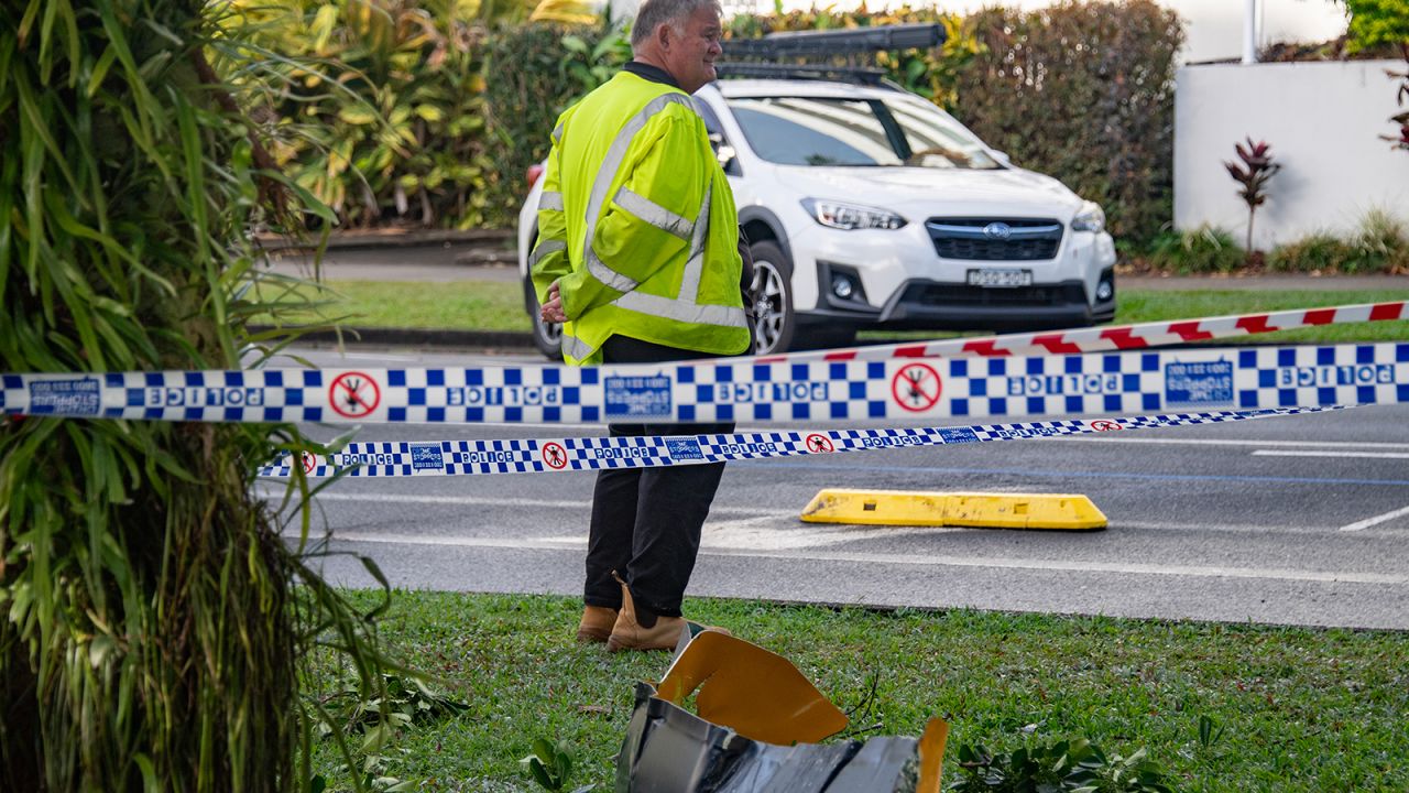 Debris from a helicopter is seen after it crashed into the roof of the DoubleTree Hilton Hotel in Cairns, Australia, on August 12, 2024.