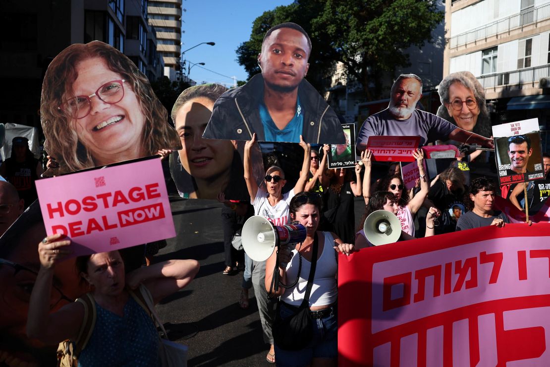 Supporters of hostages who were abducted by Hamas militants during the October 7 attacks protest on August 15 in Tel Aviv, Israel, ahead of planned Israel-Gaza ceasefire talks to be hosted in Qatar.