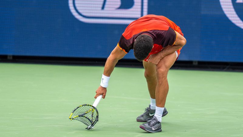 Carlos Alcaraz knocks his racket out of shape in shocking loss at Cincinnati Open