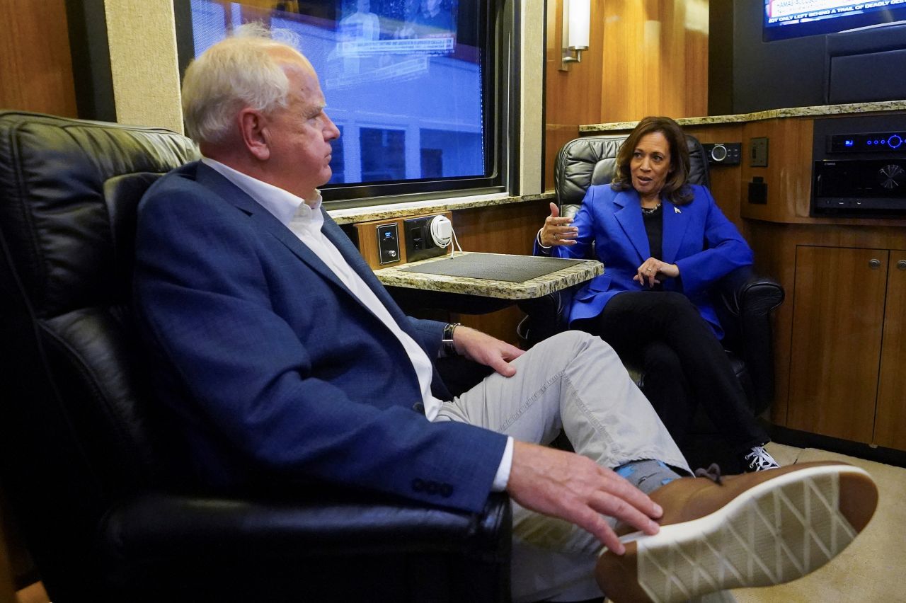 Vice President Kamala Harris and Minnesota Gov. Tim Walz speak on their campaign bus in Rochester, Pennsylvania, during a tour of western Pennsylvania on August 18.