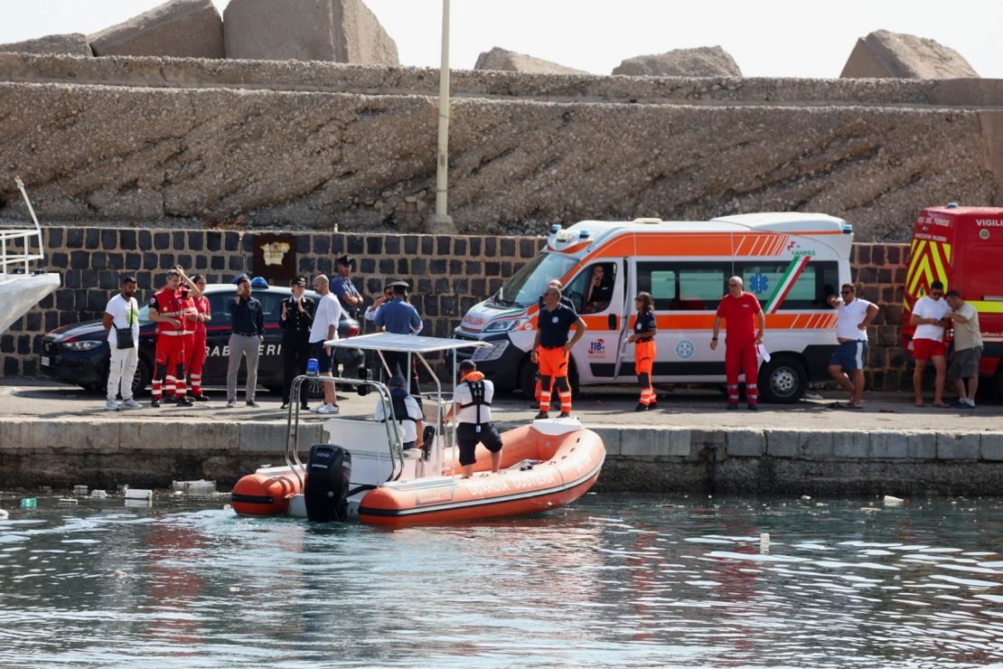 Rescue workers near Palermo, Italy, close to the scene of the incident.