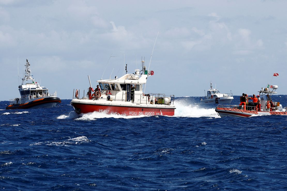 Rescue crews work near the site where a luxury yacht sank off the coast of Porticello, Italy, August 20, 2024.