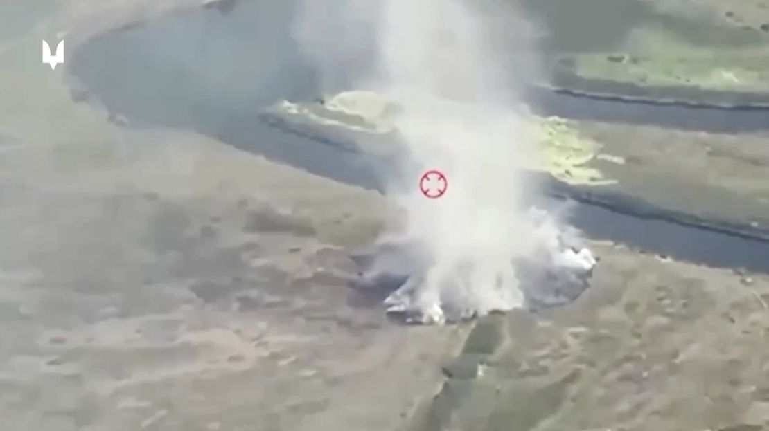 A drone view shows smoke rising after one of, what Special Forces of Ukraine say are, strikes on pontoon crossings over the Seym river, near Glushkovo, Kursk Region, Russia..