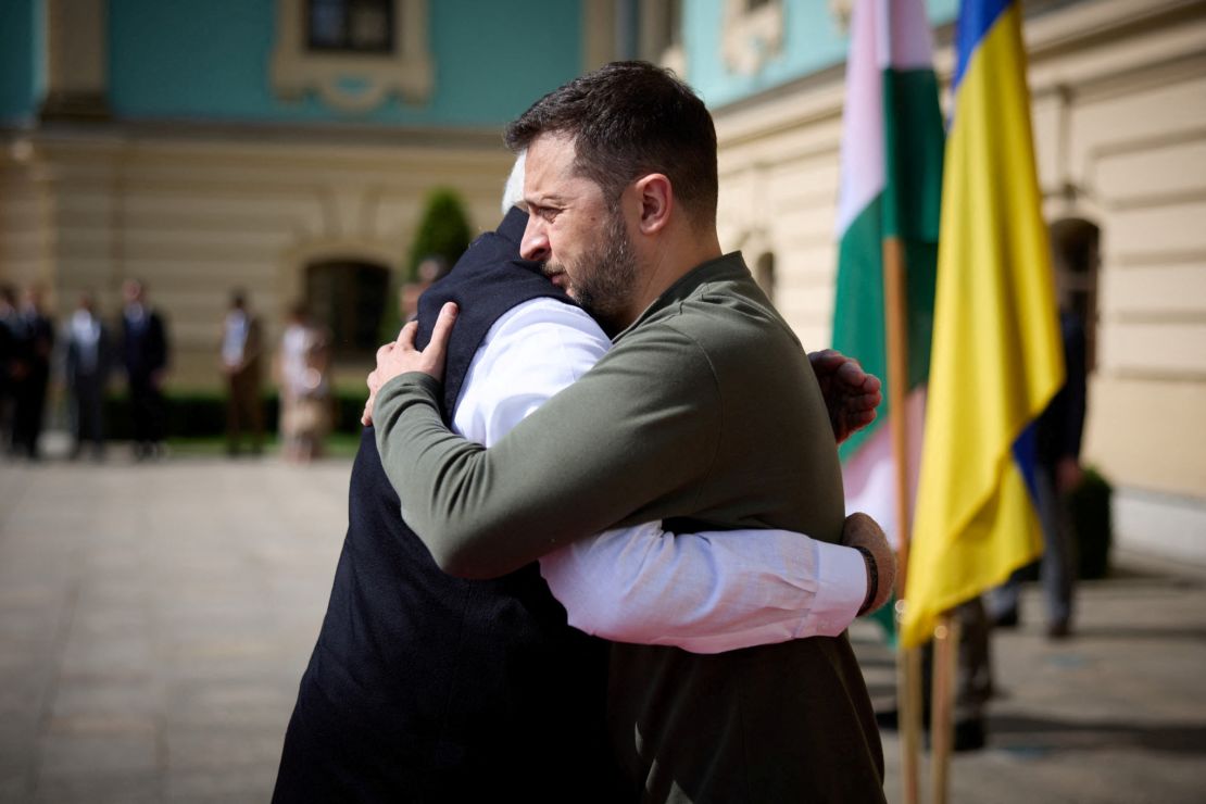 Zelensky welcomes Modi outside the presidential palace in Kyiv.