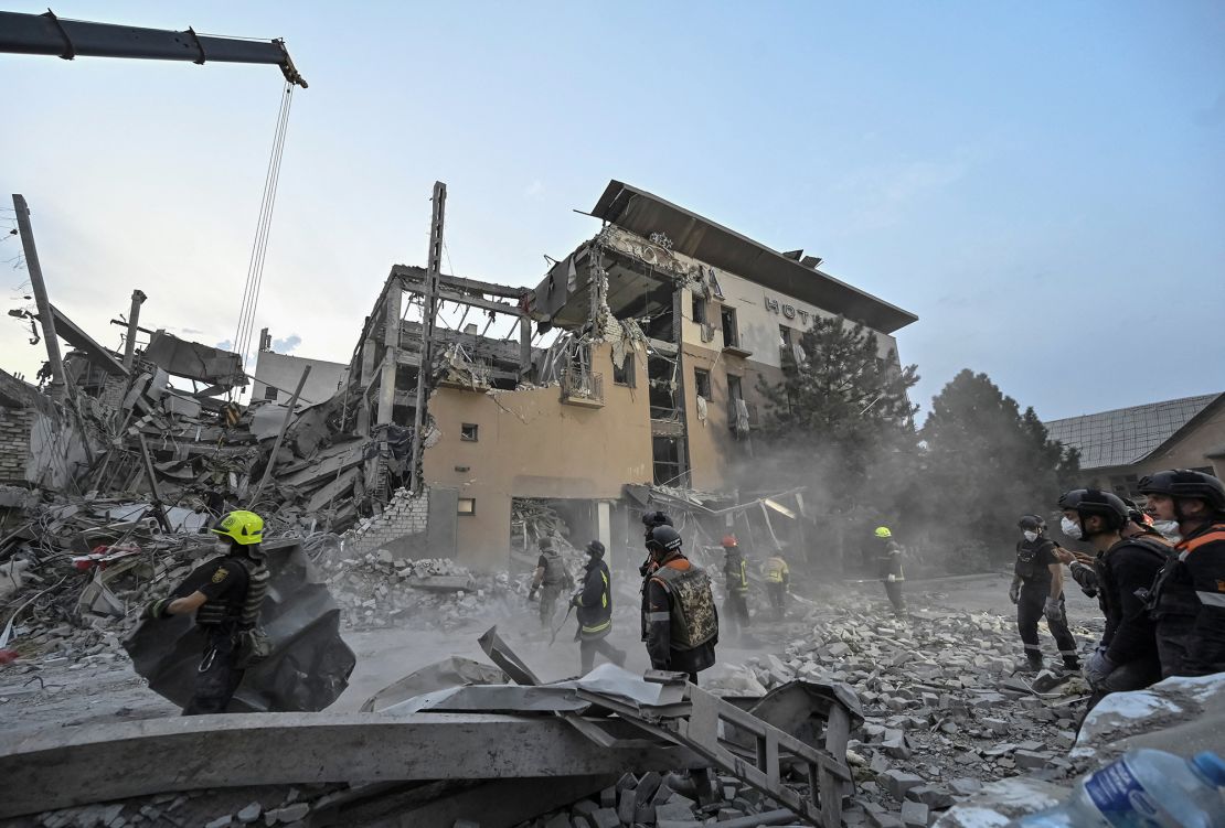 Rescuers work at the site of a Russian strike on a hotel in Kryvyi Rih, Ukraine, August 27, 2024.