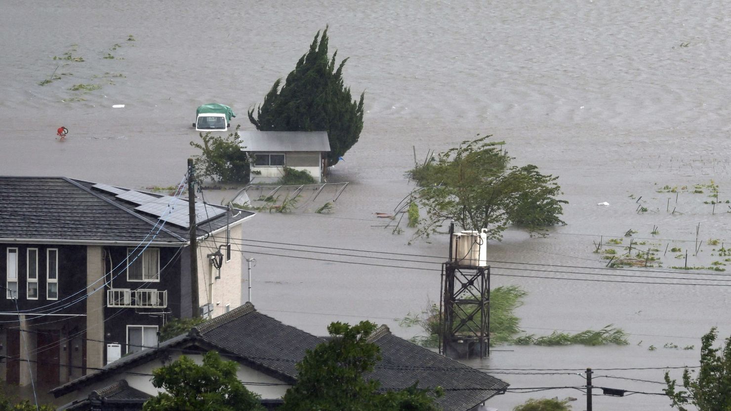 Farmland is submerged due to floods caused by heavy rains from Typhoon Shanshan in Yufu, Oita prefecture, southwestern Japan, on August 29, 2024.