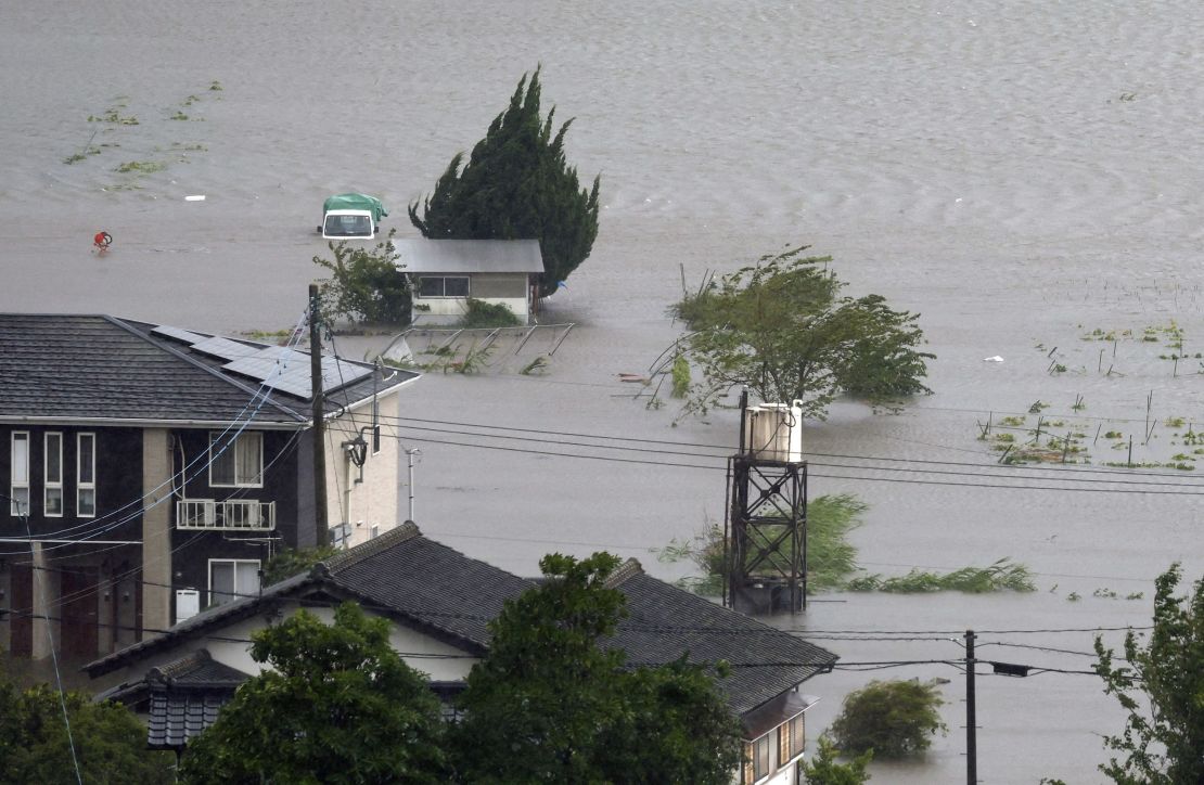 Farmland submerged due to flooding caused by heavy rains from Typhoon Shanshan in Yufu, Oita Prefecture, southwestern Japan.