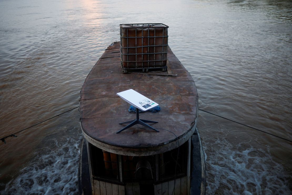 A Starlink satellite internet system is set up on a miner's boat on the Madeira River in Porto Velho, Rondonia state, Brazil, on July 4, 2024.