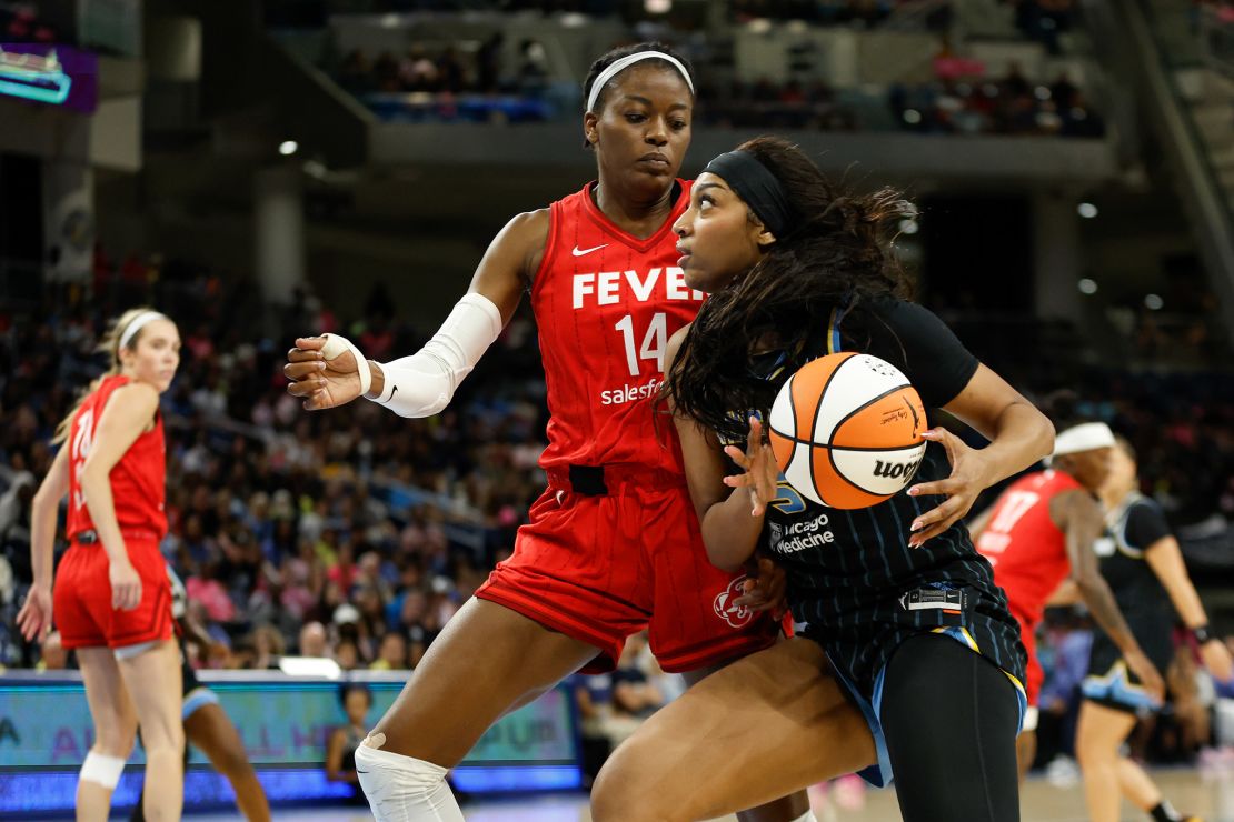 Angel Reese looks to shoot against Indiana Fever.