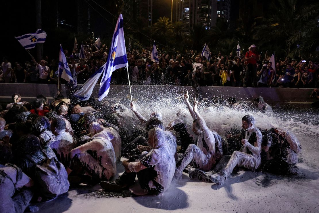 Police use water canon during a rally to show support for the hostages who were kidnapped during the deadly October 7 attack, amid the ongoing conflict in Gaza between Israel and Hamas, in Tel Aviv, Israel September 1, 2024. REUTERS/Tomer Appelbaum TPX IMAGES OF THE DAY. ISRAEL OUT. NO COMMERCIAL OR EDITORIAL SALES IN ISRAEL