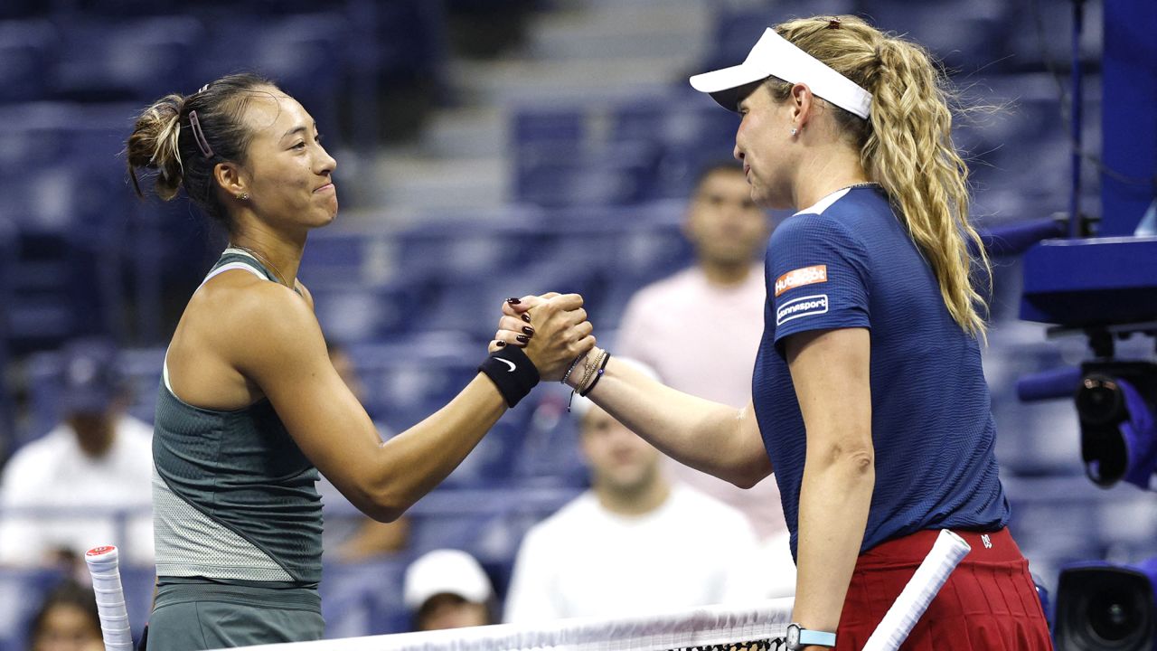 Sep 1, 2024; Flushing, NY, USA; Qinwen Zheng (CHN) (L) shakes hands with Donna Vekic (CRO)(R) after their women's singles match on day seven of the 2024 U.S. Open tennis tournament at USTA Billie Jean King National Tennis Center. Mandatory Credit: Geoff Burke-USA TODAY Sports