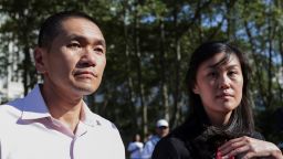 Linda Sun, a former aide to New York State Gov. Kathy Hochul, exits Brooklyn Federal court accompanied by her husband, Chris Hu.