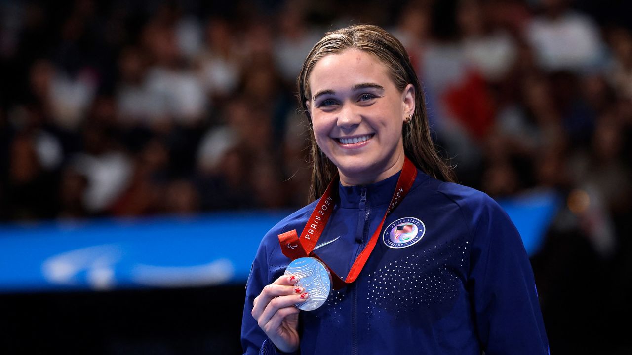 Ali Truwit celebrates her first silver medal of the Paris Paralympic Games.