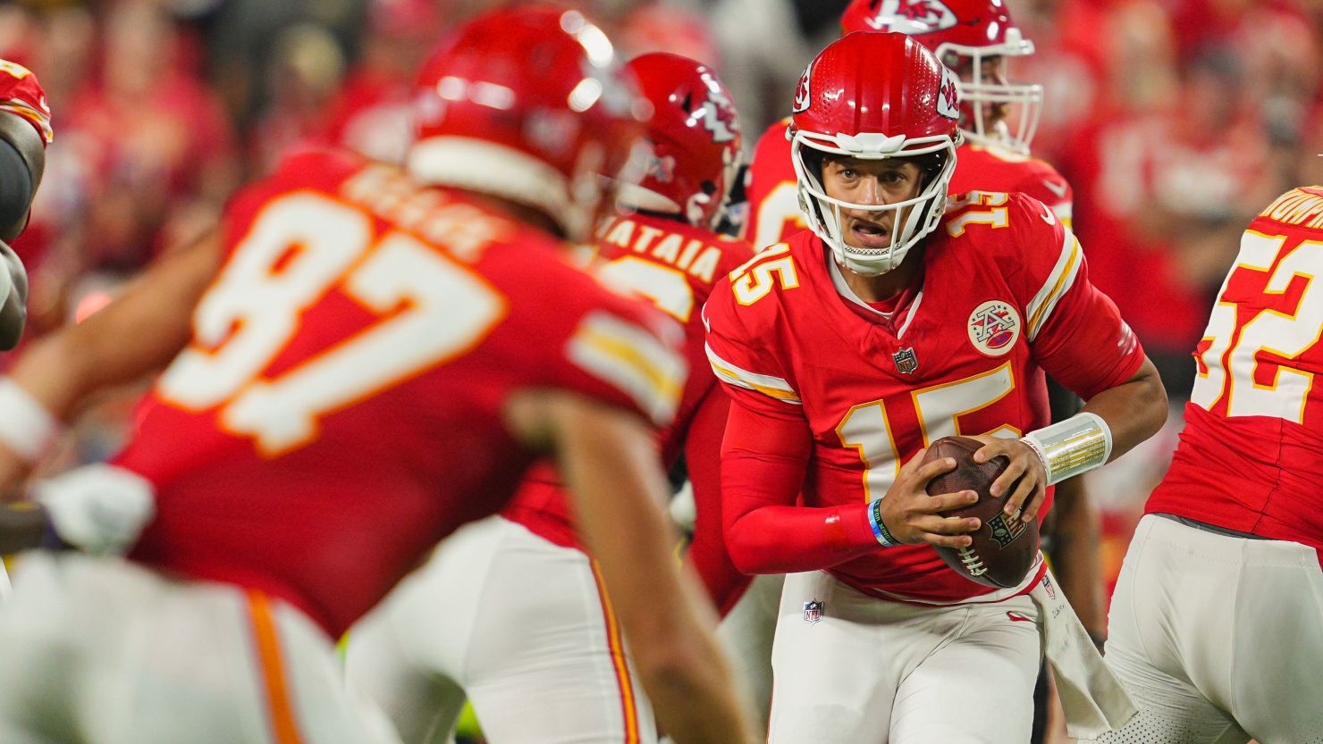 Kansas City Chiefs quarterback Patrick Mahomes scrambles during the first half against the Baltimore Ravens.