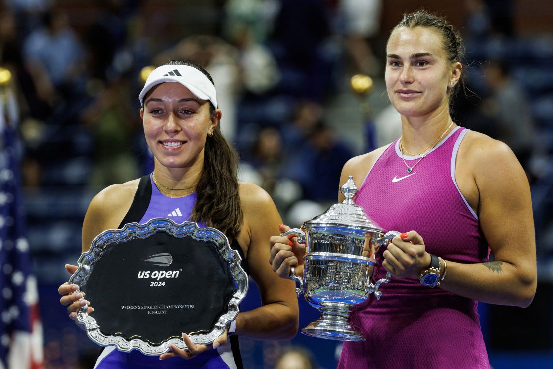 Sep 7, 2024; Flushing, NY, USA; Aryna Sabalenka of Belarus and Jessica Pegula of the United States pose with their trophies after the final of the women’s singles on day thirteen of the U.S. Open tennis tournament at the USTA Billie Jean King National Tennis Center. Mandatory Credit: Mike Frey-Imagn Images