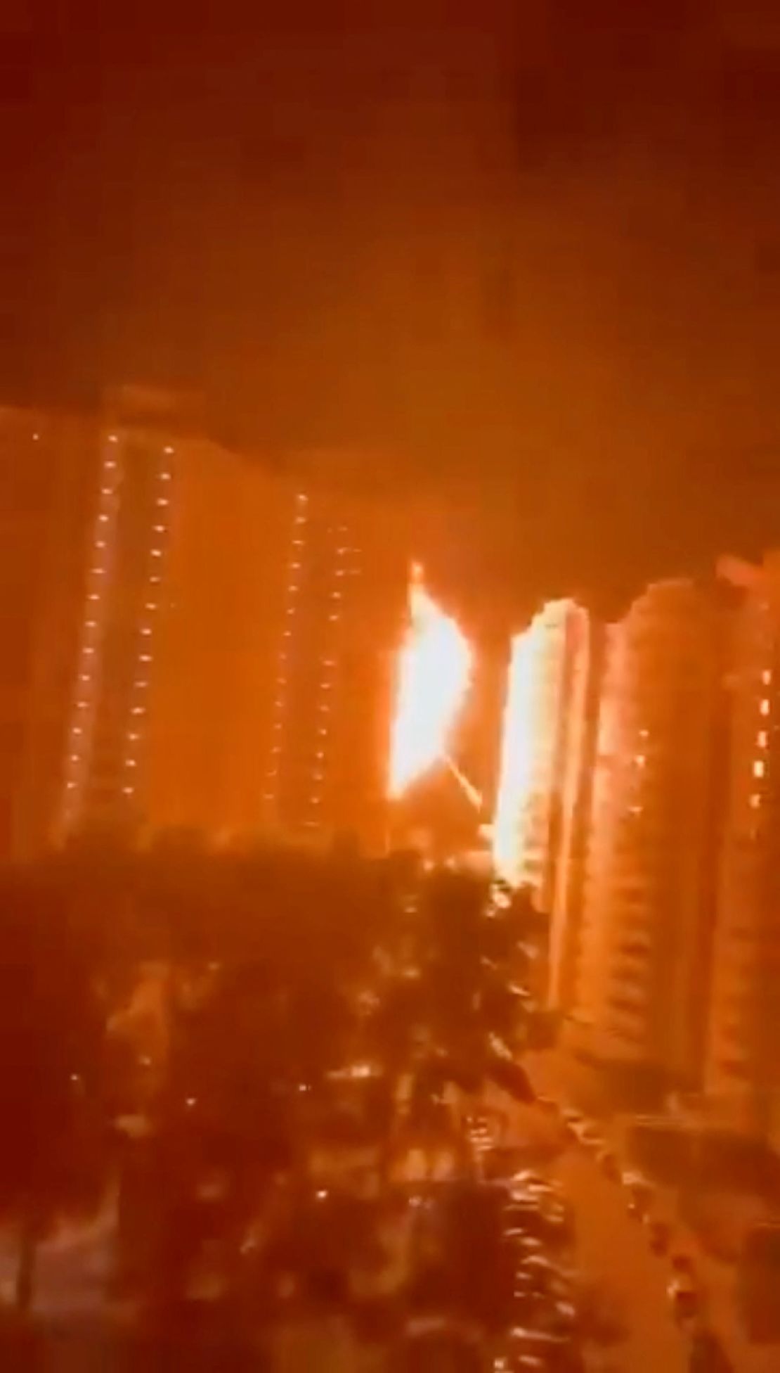 This image from social media shows the moment a building is hit by an explosion.